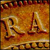 Letter-shape variations in the reverse legend of George V pennies